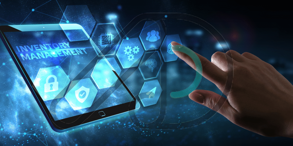 A tablet displaying "INVENTORY MANAGEMENT" and a hand interacting with a holographic interface, representing modern ERP software for manufacturing.